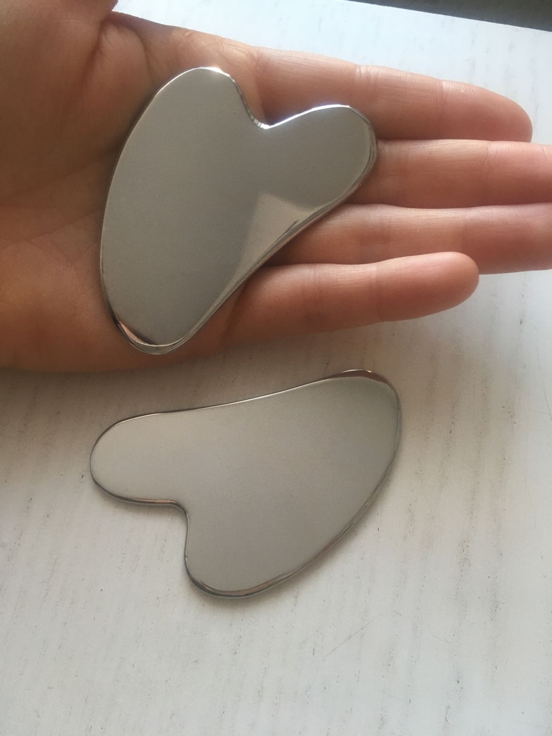 Customer photo review of Gua Sha Acier Inoxydable