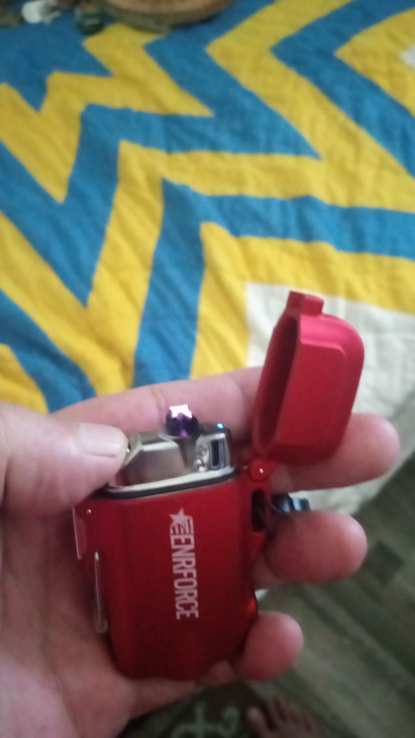 Customer photo review of Metallic Red Arc Lighter