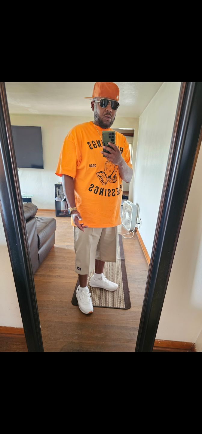 Customer photo review of Mystery Box of 12 T-Shirts