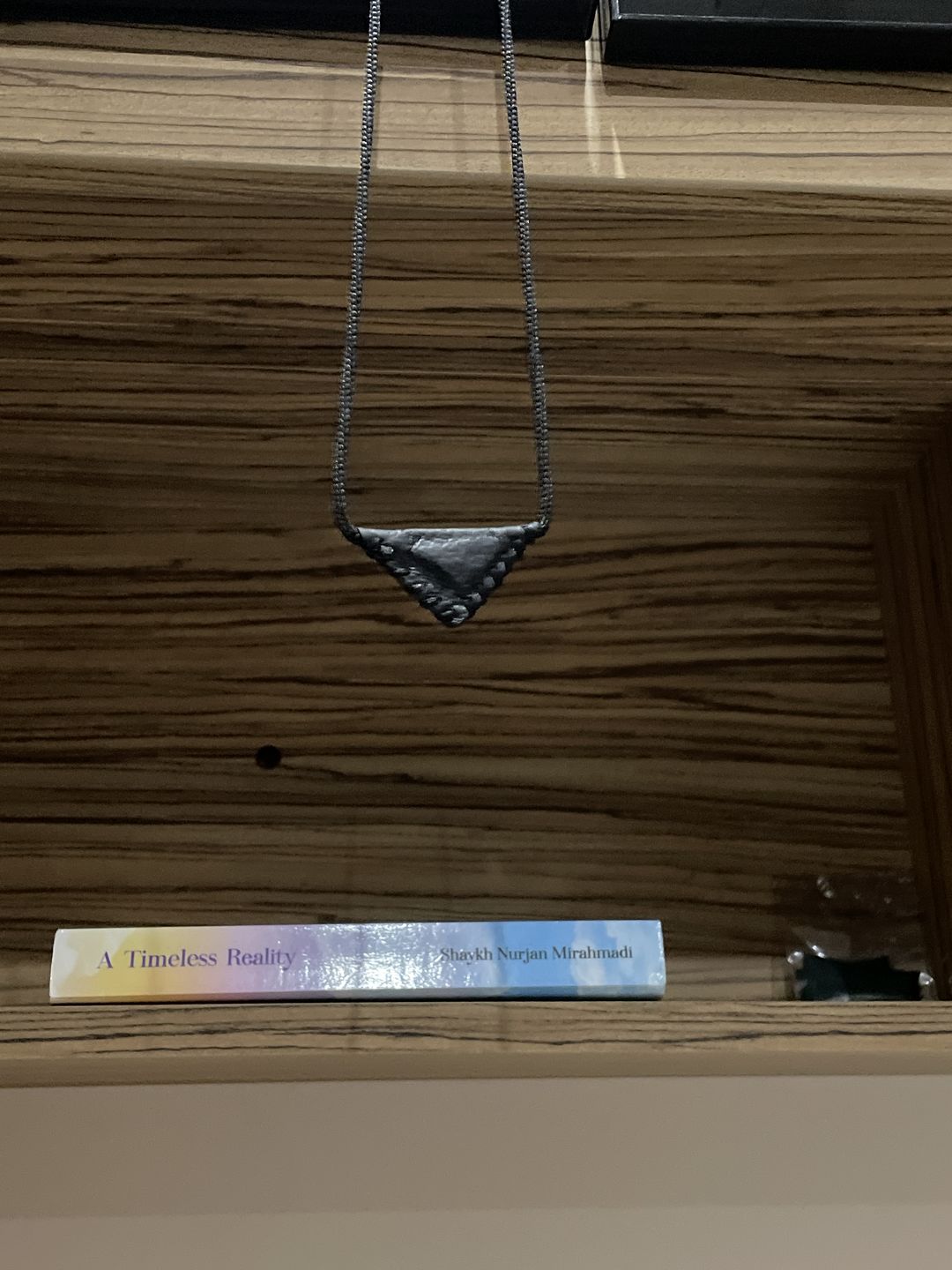 Customer photo review of Naqshbandi Taweez Necklace from Shaykh Nazim