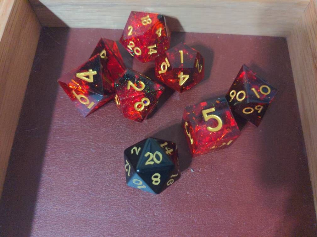 Customer photo review of Gemstone Night Obsidian Hand Carved Polyhedral Dice (And Box) DnD Dice Set - Gift For Dnd, RPG Game DND MTG Game
