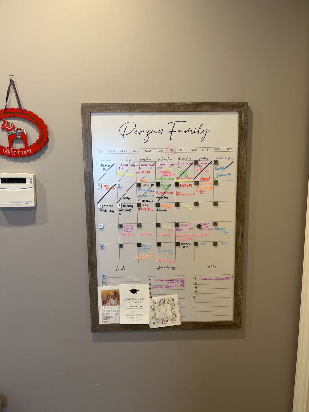 Customer photo review of Monthly Framed Whiteboard Calendar + 3 sections | Vertical Pennington