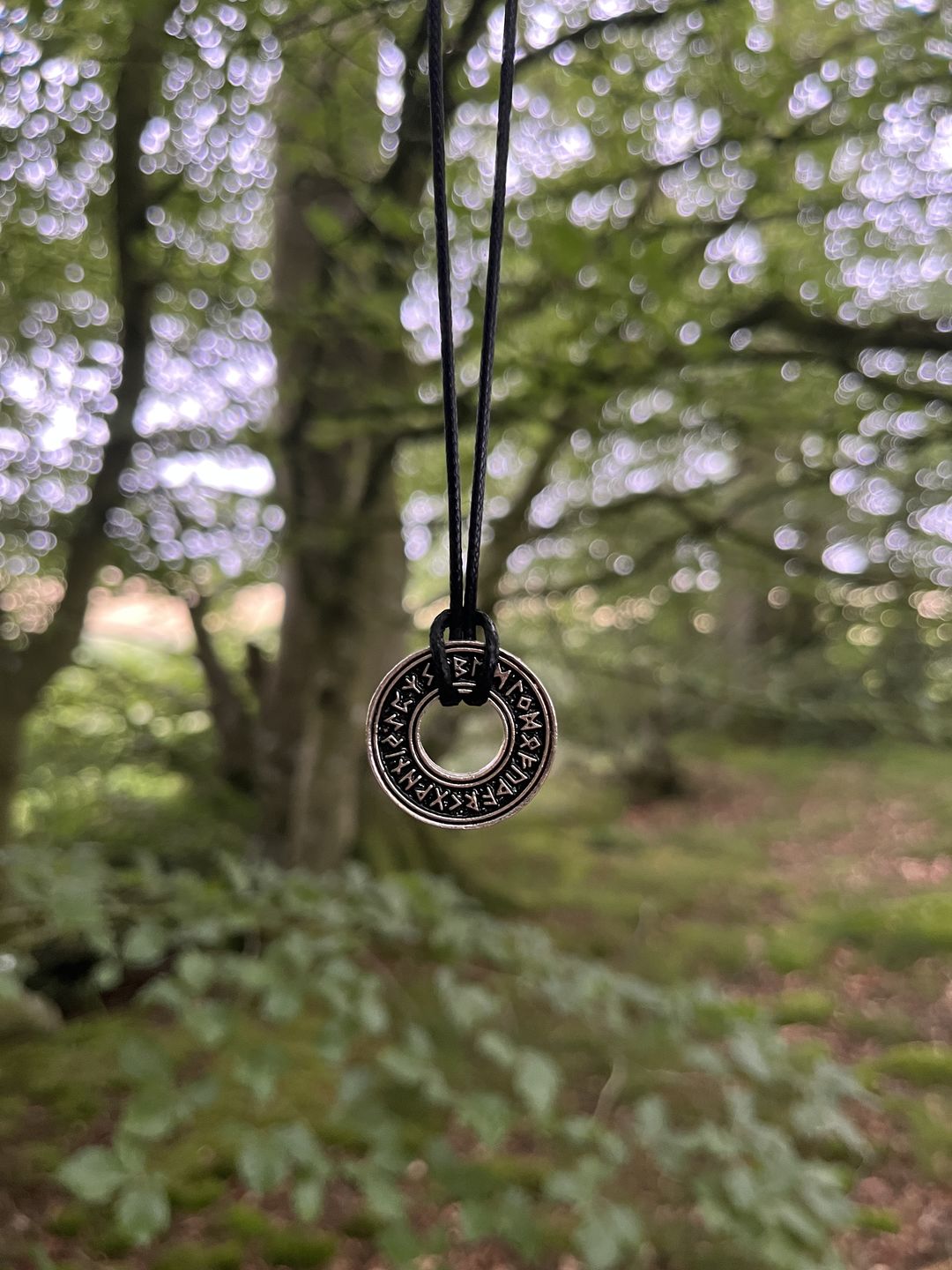 Customer photo review of Runed Coin Pendant