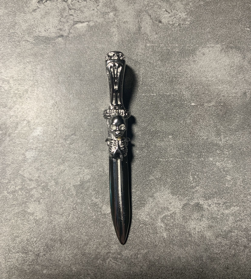 Customer photo review of CATACOMB SWORD PENDANT