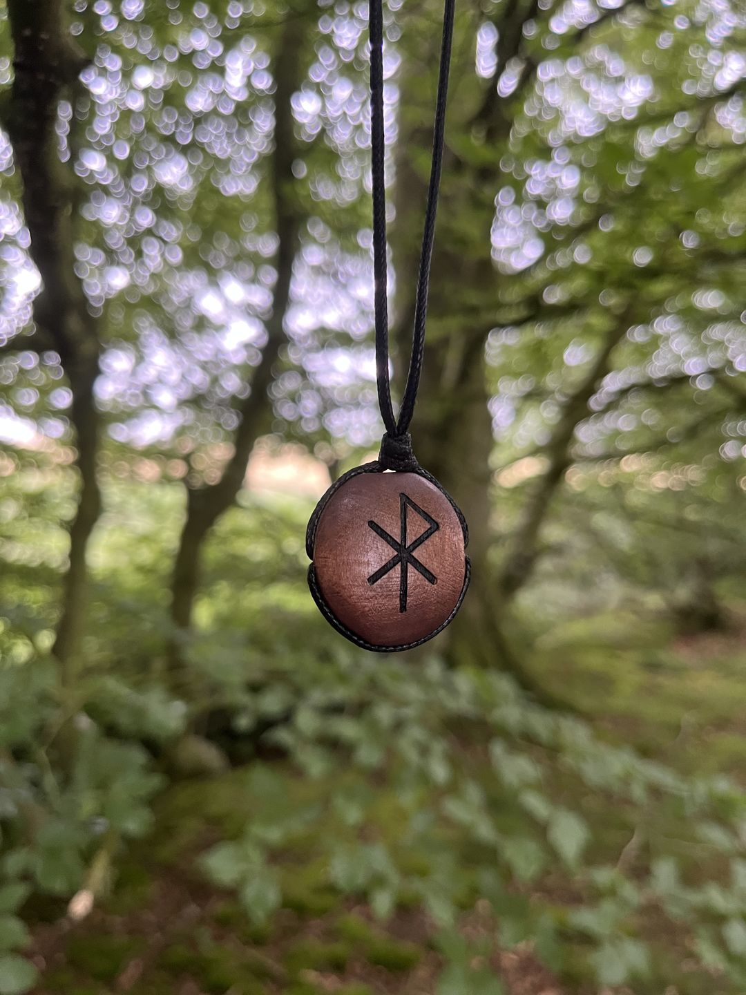 Customer photo review of Engraved Wood Bind Rune Pendant