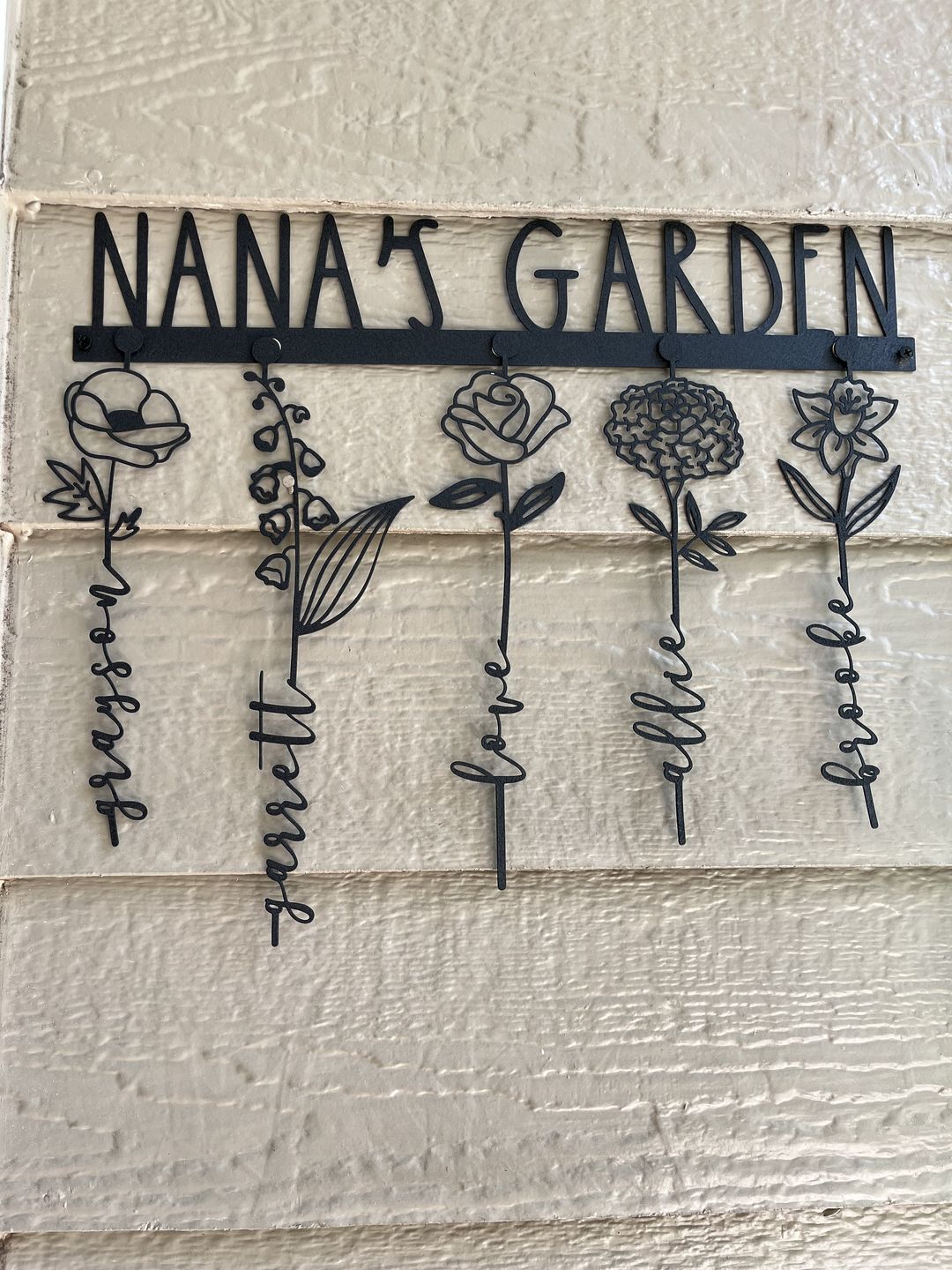 Customer photo review of Our Family Garden - Personalized Birth Month Flowers Family Name Sign Mother's Day Gift