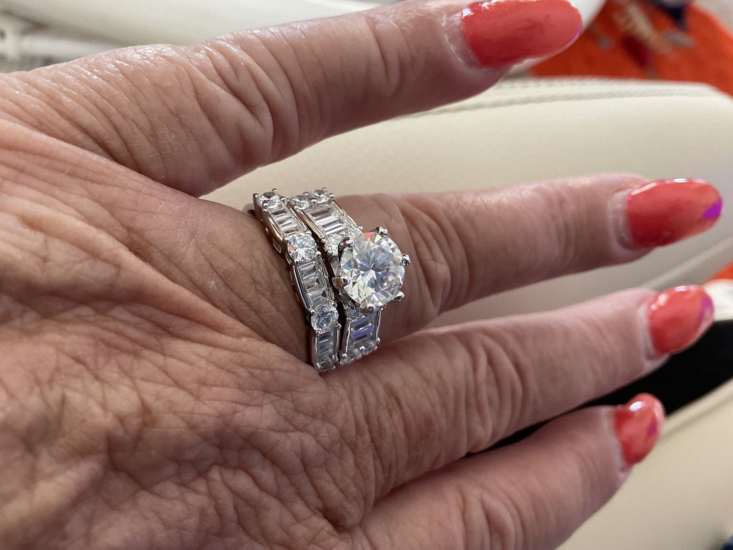 Customer photo review of Round Moissanite Emerald-Cut Side Stone Engagement Ring