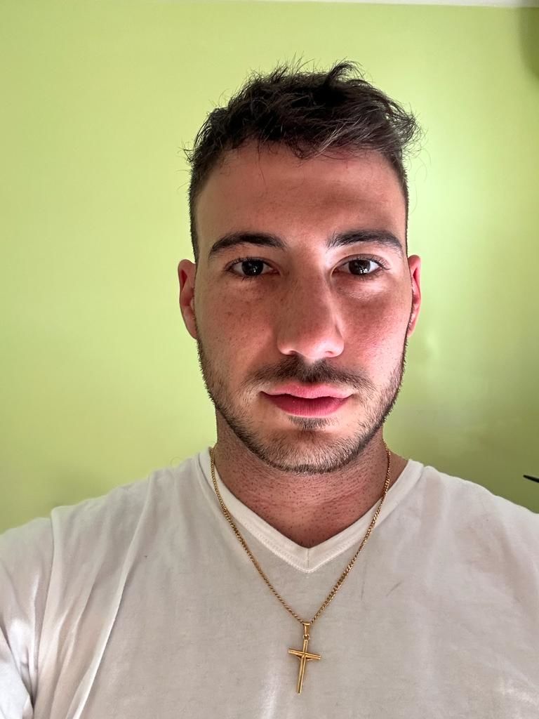 Customer photo review of Cross Pendant - Gold
