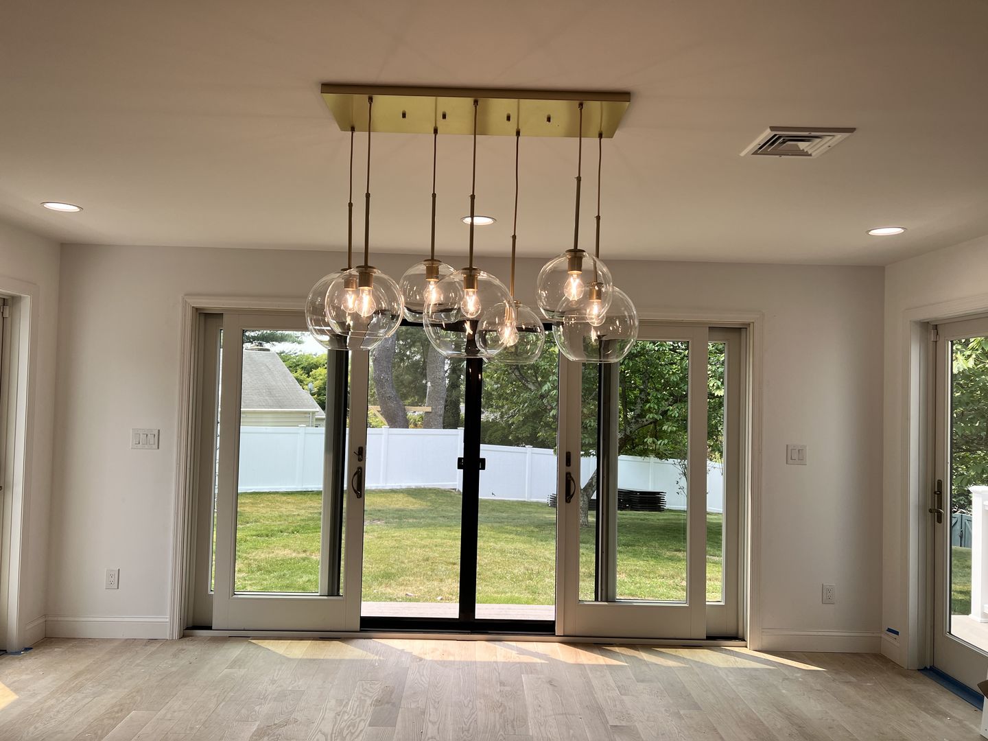 Customer photo review of Modern 7-Light Sculptural Glass Globe Pendant Chandelier