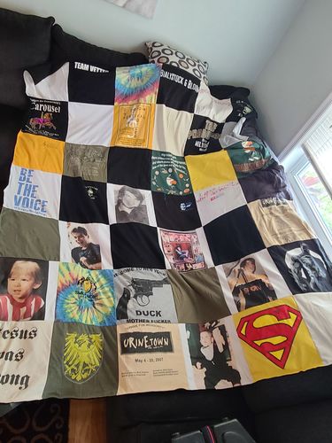T-shirt quilt with theater, music themes by Kathy from FL