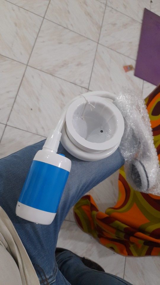 Customer photo review of DouchePro 5000 - Douche Électrique Portative