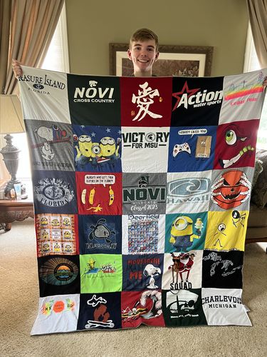T-shirt quilt featuring novi high school cross country team by Dawn from MI