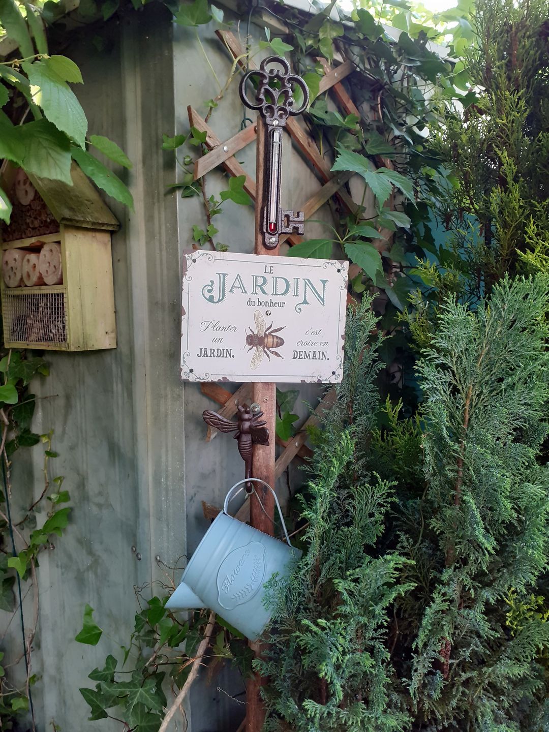 Customer photo review of Joie dans le jardin - Plaque de porte personnalisée