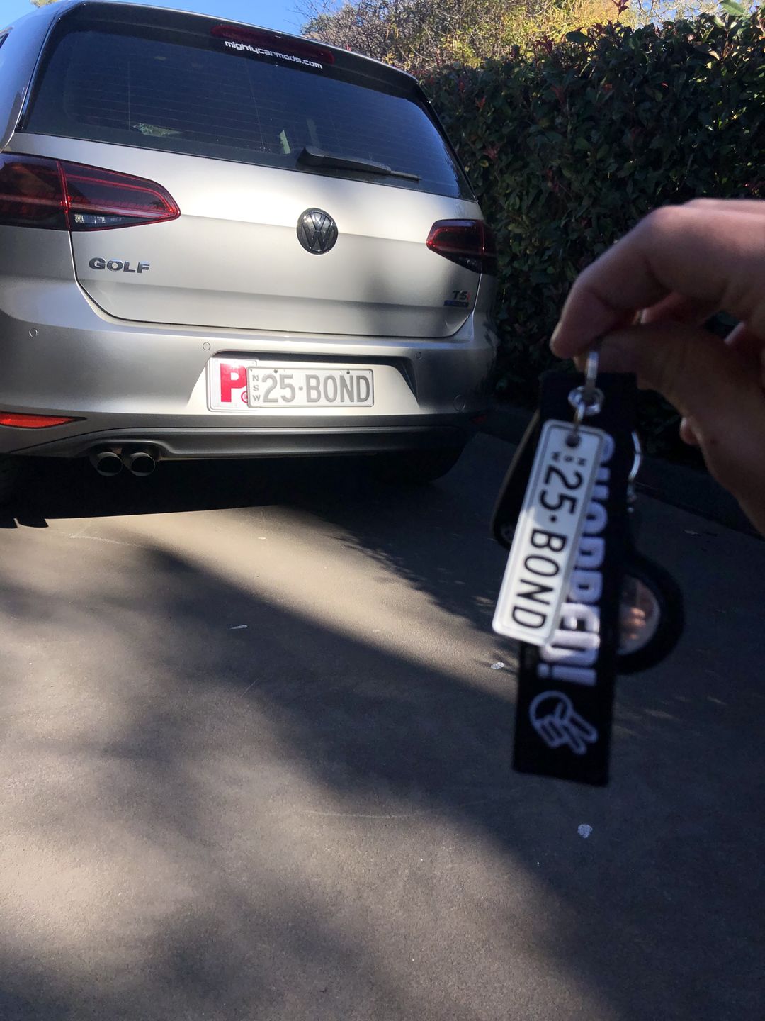 Customer photo review of NSW Colour on White Licence Plate Custom Keychain