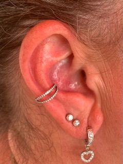 Customer photo review of Double Clicker Piercing | Titan