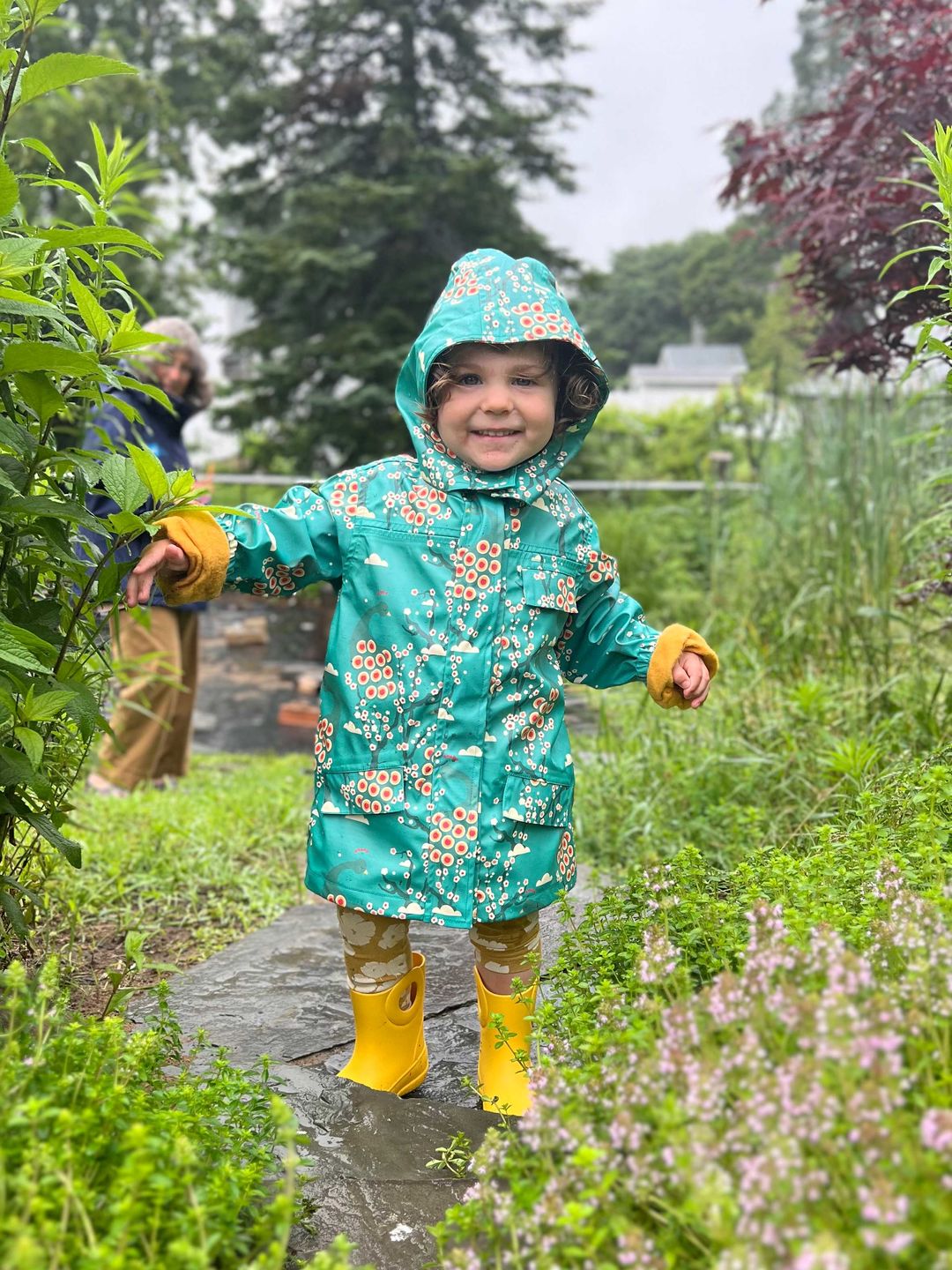 Customer photo review of Midnight Peacocks Waterproof Recycled Raincoat
