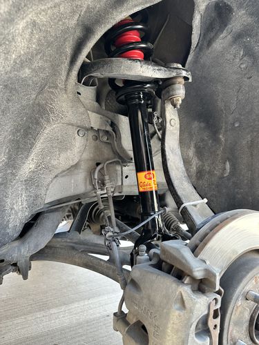 Customer photo review of 2011-2015 Jeep Grand Cherokee Air Suspension Conversion/Delete Kit with Module and Camber Bolts for 4x4 V6 and V8 Engines (JC14FMCKL)