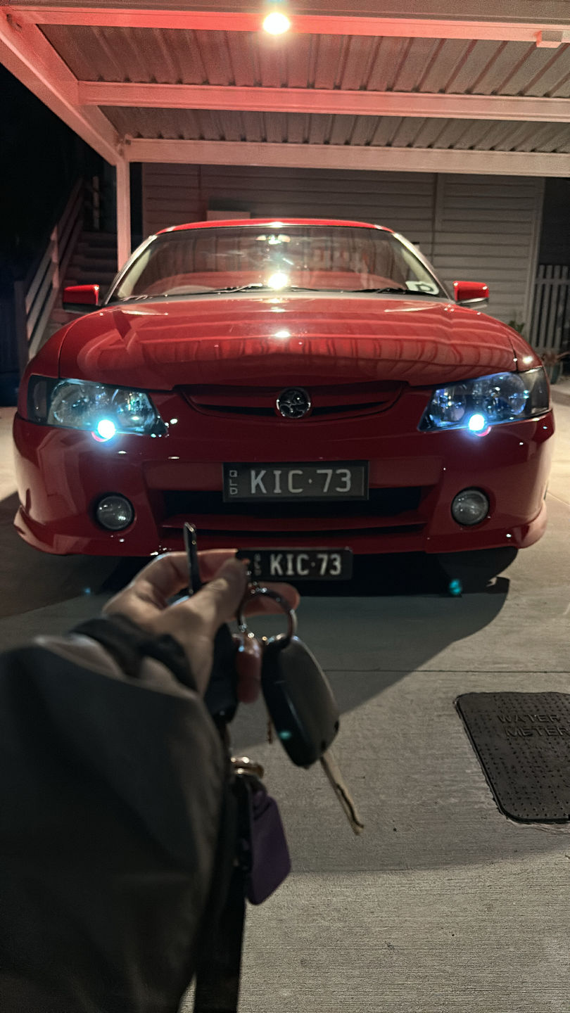 Customer photo review of QLD Prestige Licence Plate Custom Keychain