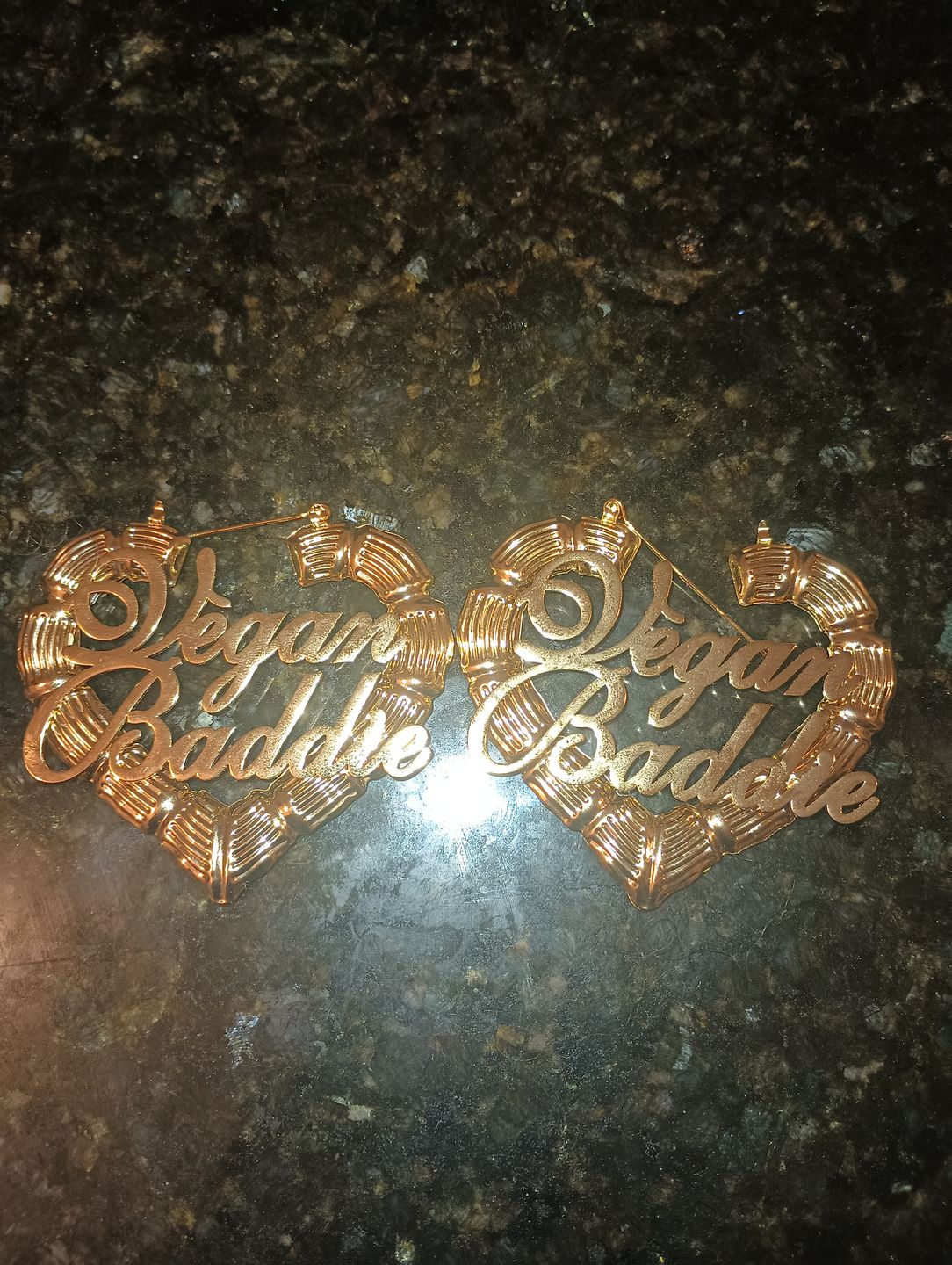 Customer photo review of Vegan Baddie 18k Gold Plated Bamboo Hoop Heart Earrings