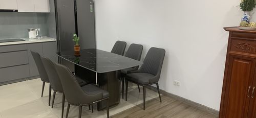 Customer photo review of HELIO - Bàn ăn mặt đá chân ống đôi