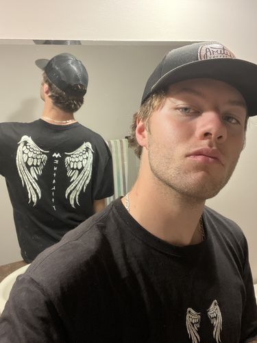 Customer photo review of MENTALITY WINGS TEE