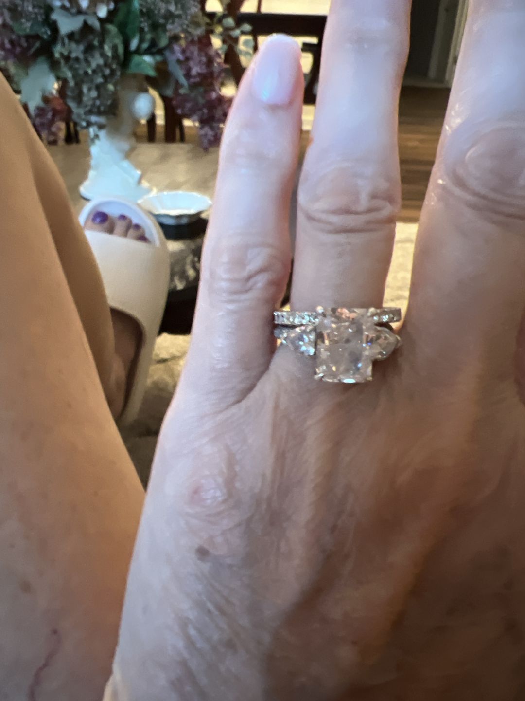 Customer photo review of Louily 5.0 Carat Radiant Cut Three Stone Engagement Ring With Two Heart Cut Side Stones