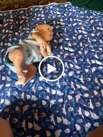 Customer video review of Patterned Machine Washable Reversible Indoor/Outdoor Quilted Water Resistant Play Mat Blanket