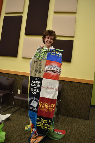 T-shirt quilt with camping, quizzing themes by Rebecca from OH