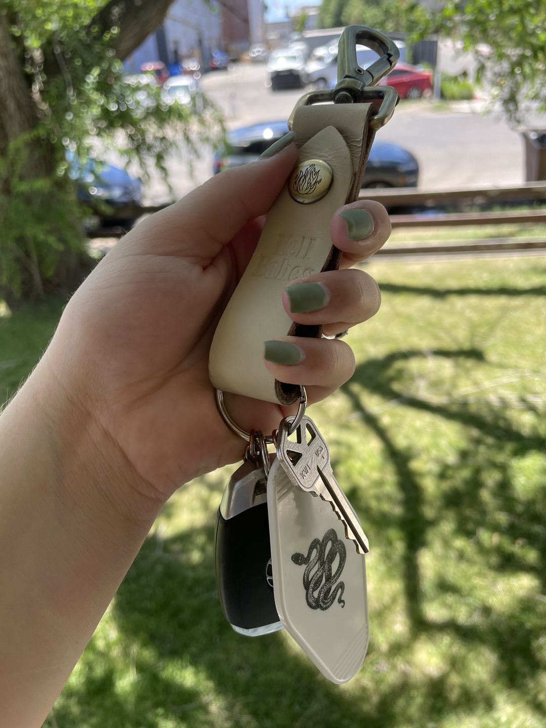 Customer photo review of Rebel Things Off-White Leather Keychain