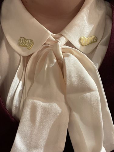 Customer photo review of They/Them Pronoun Pins