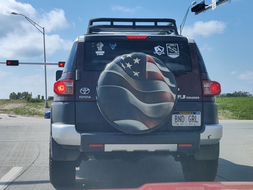 Customer photo review of 3D-ish American Flag Waving Spare Tire Cover