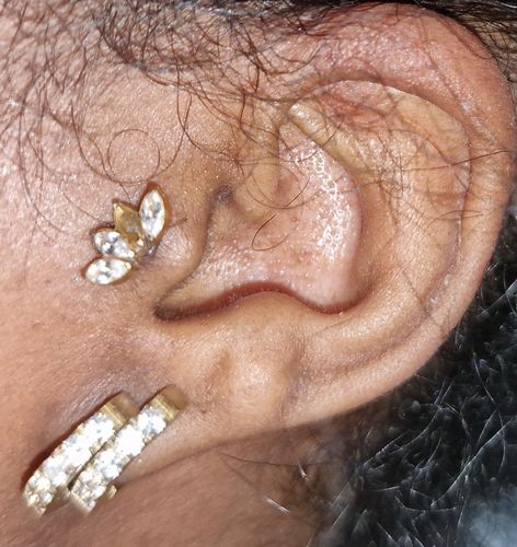 Customer photo review of Le piercing Lotus