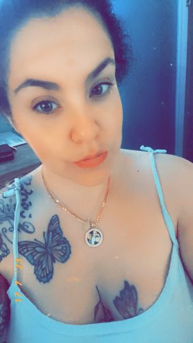 Customer photo review of Iced Out Round Shape Portrait Necklace with Zirconia