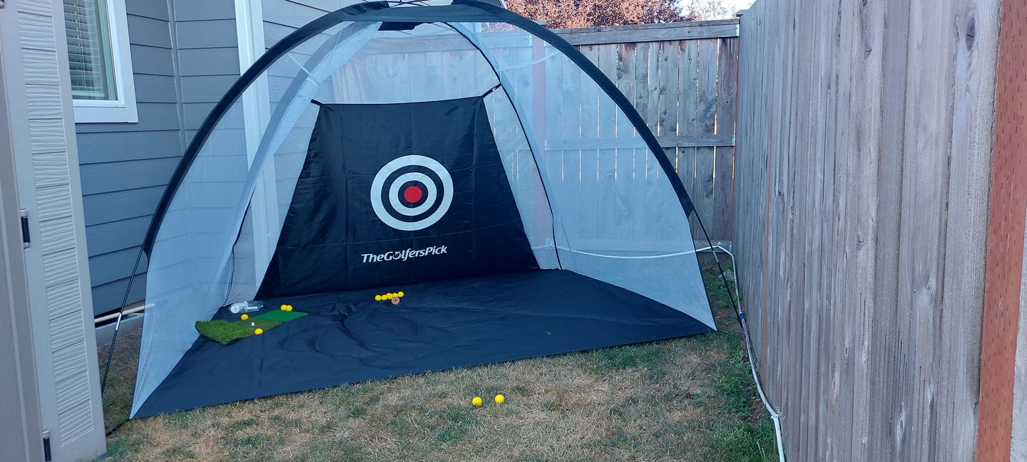 Customer photo review of Golf Practice Driving Net for Indoors and Outdoors | Tri-Turf Hitting Mat