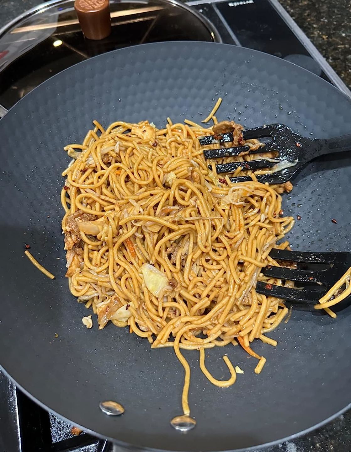 Customer photo review of WANGYUANJI Lightweight Carbon Steel Wok Pan 12" with Lid