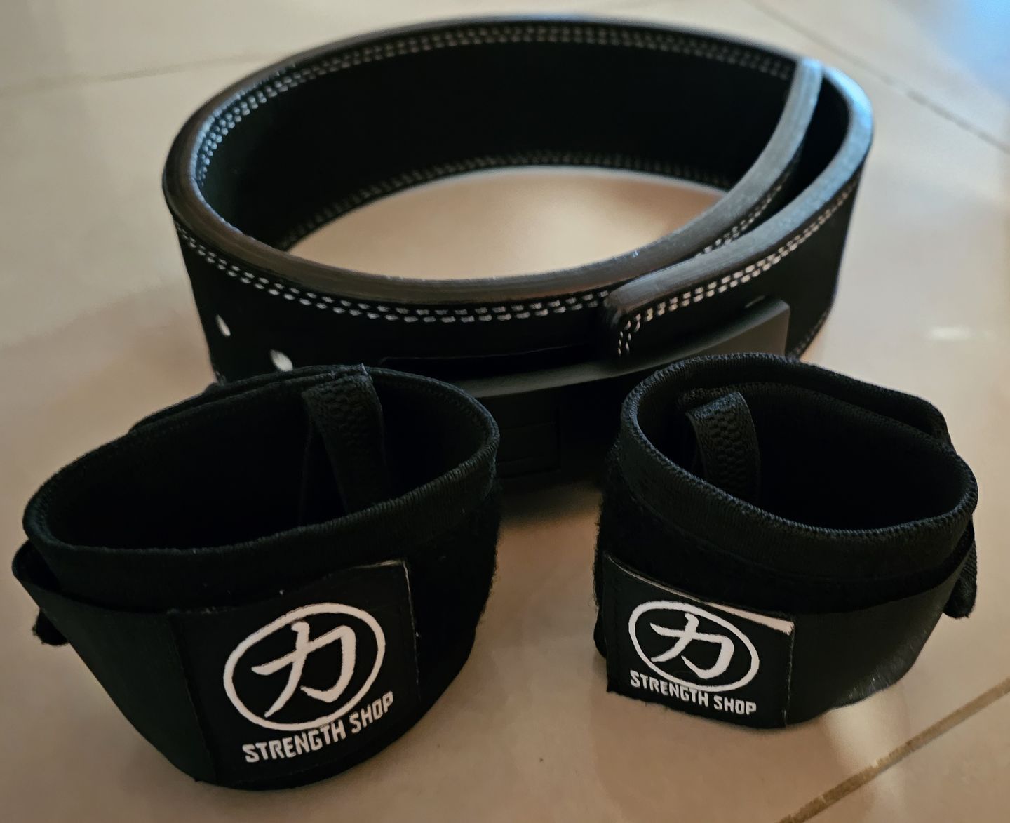 Customer photo review of Strength Shop Super Stiff Wrist Wraps - Black - USPA & IPF Approved