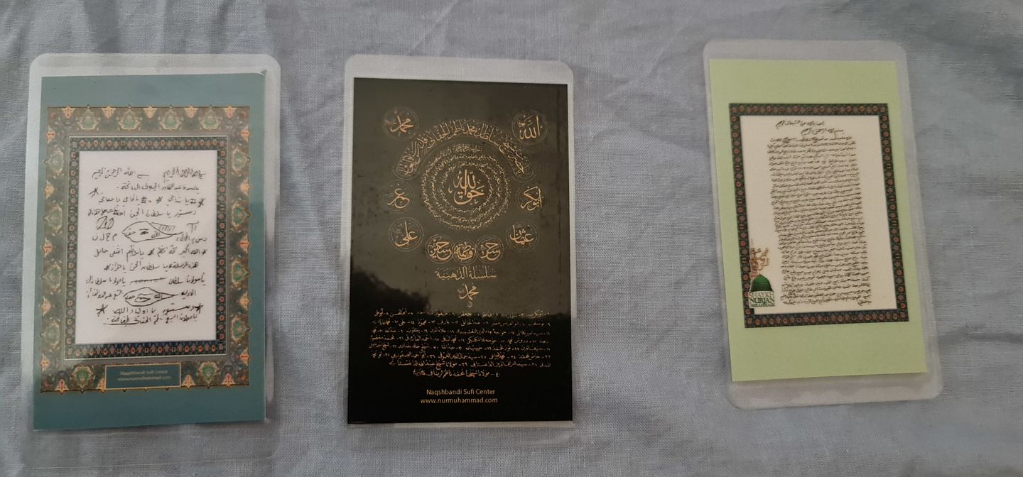 Customer photo review of Laminated Taweezes Pocket Wallet Small (1.5" x 2")