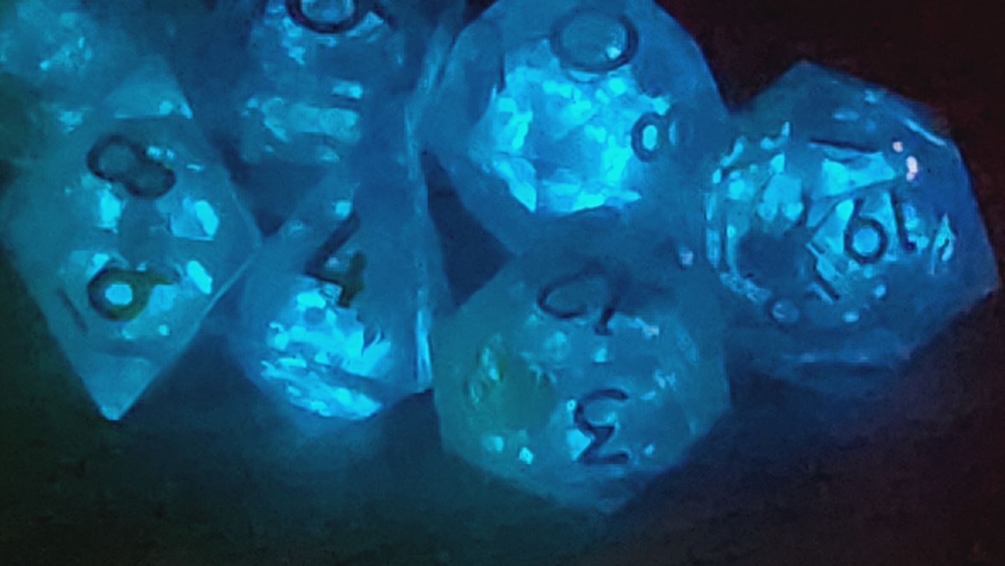 Customer photo review of URWizards D&D Glow in the Dark Liquid Core Resin Engraved Dice Set Jellyfish