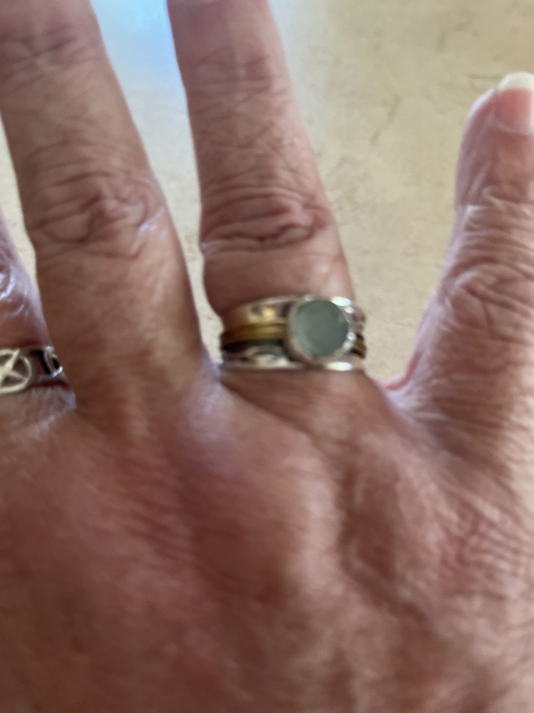 Customer photo review of Aquamarine Spinner Ring Inspired by Nature Sterling Silver