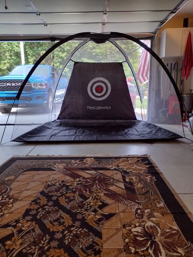 Customer photo review of Golf Practice Driving Net for Indoors and Outdoors | Tri-Turf Hitting Mat