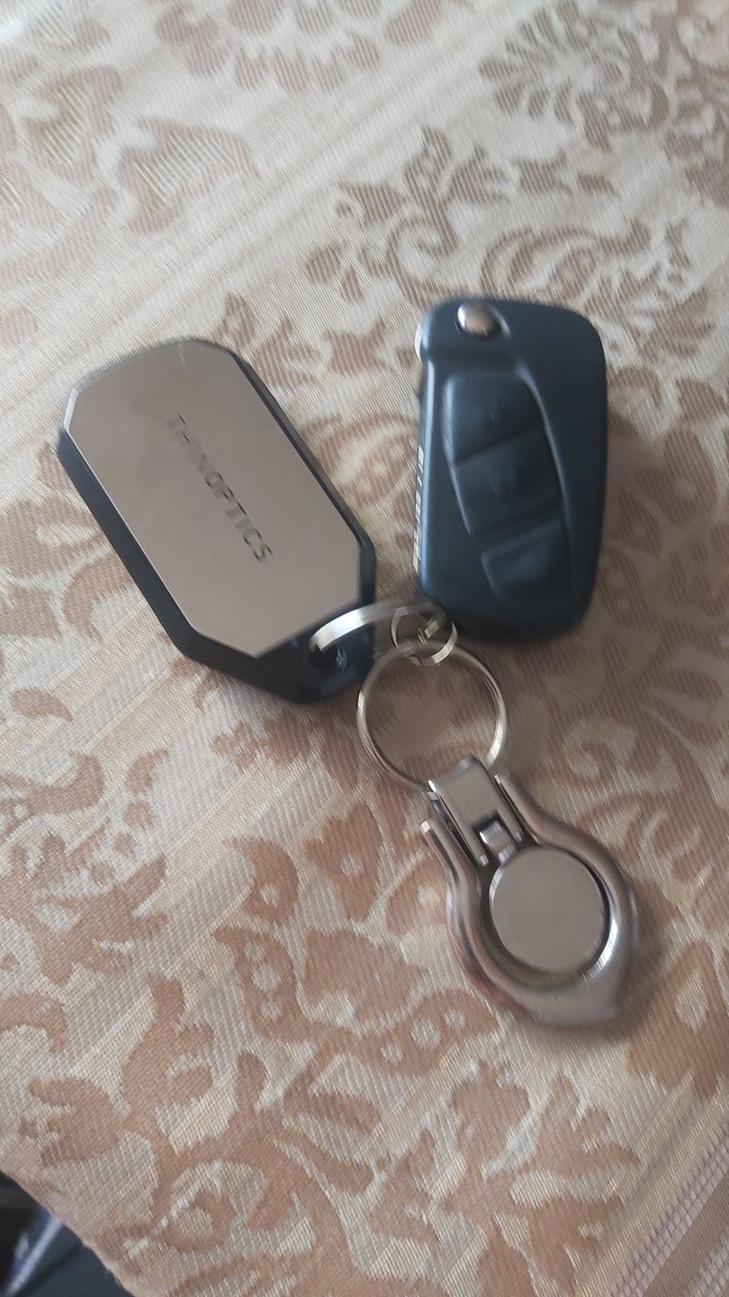 Customer photo review of Readers + Silver Keychain Case