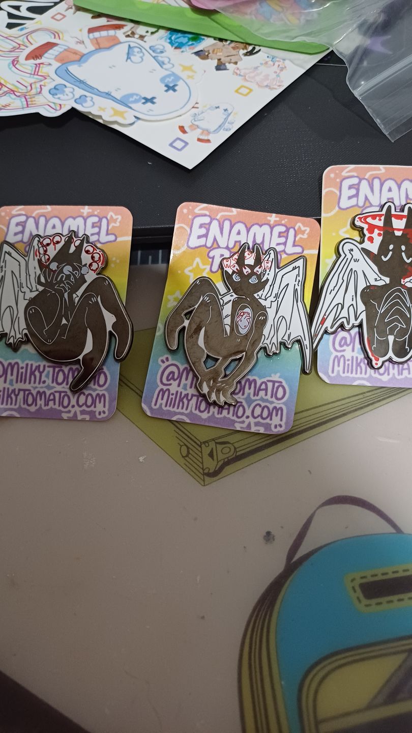 Customer photo review of Gore Angel Enamel Pins