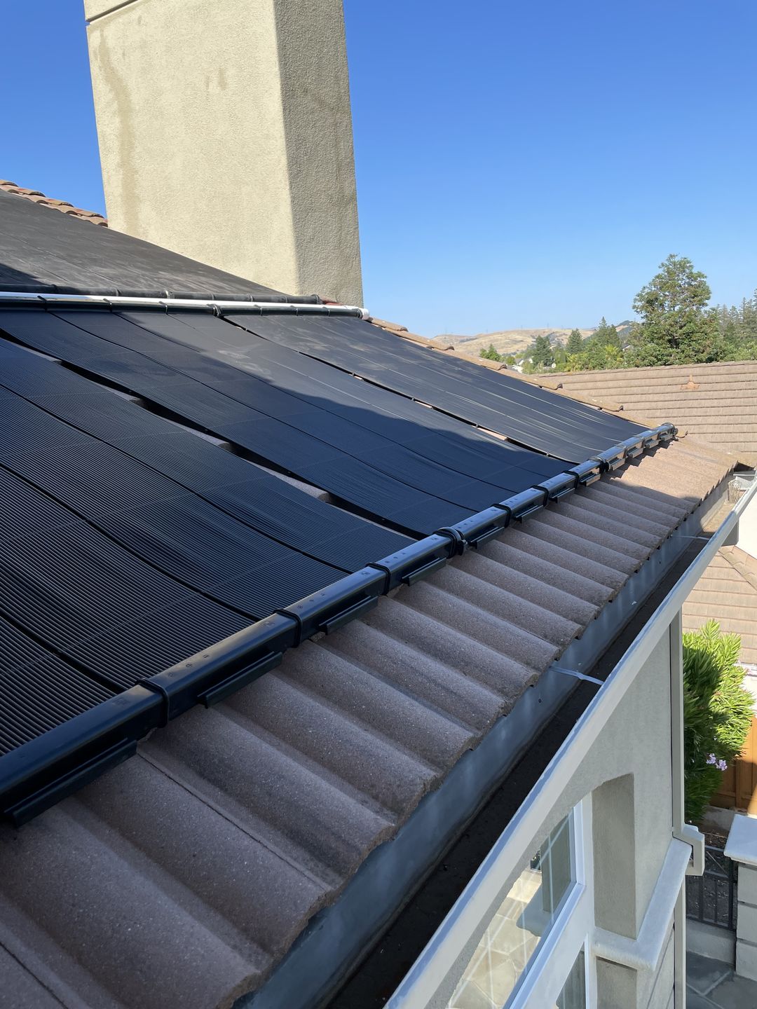 Customer photo review of SwimJoy Industrial Grade Solar Pool Heater - Superior High Wind Security - Strapless Mounting Design - Ultimate Freeze Protection