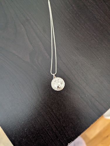 Customer photo review of Aquarius Amulet Pendant