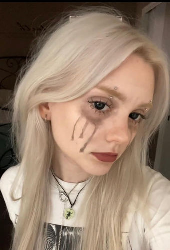 Customer photo review of Darknight Black Contact Lenses(12 months of use)