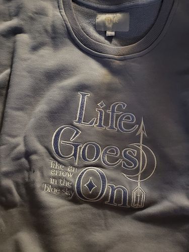 Customer photo review of Life Goes On Crewneck Sweater