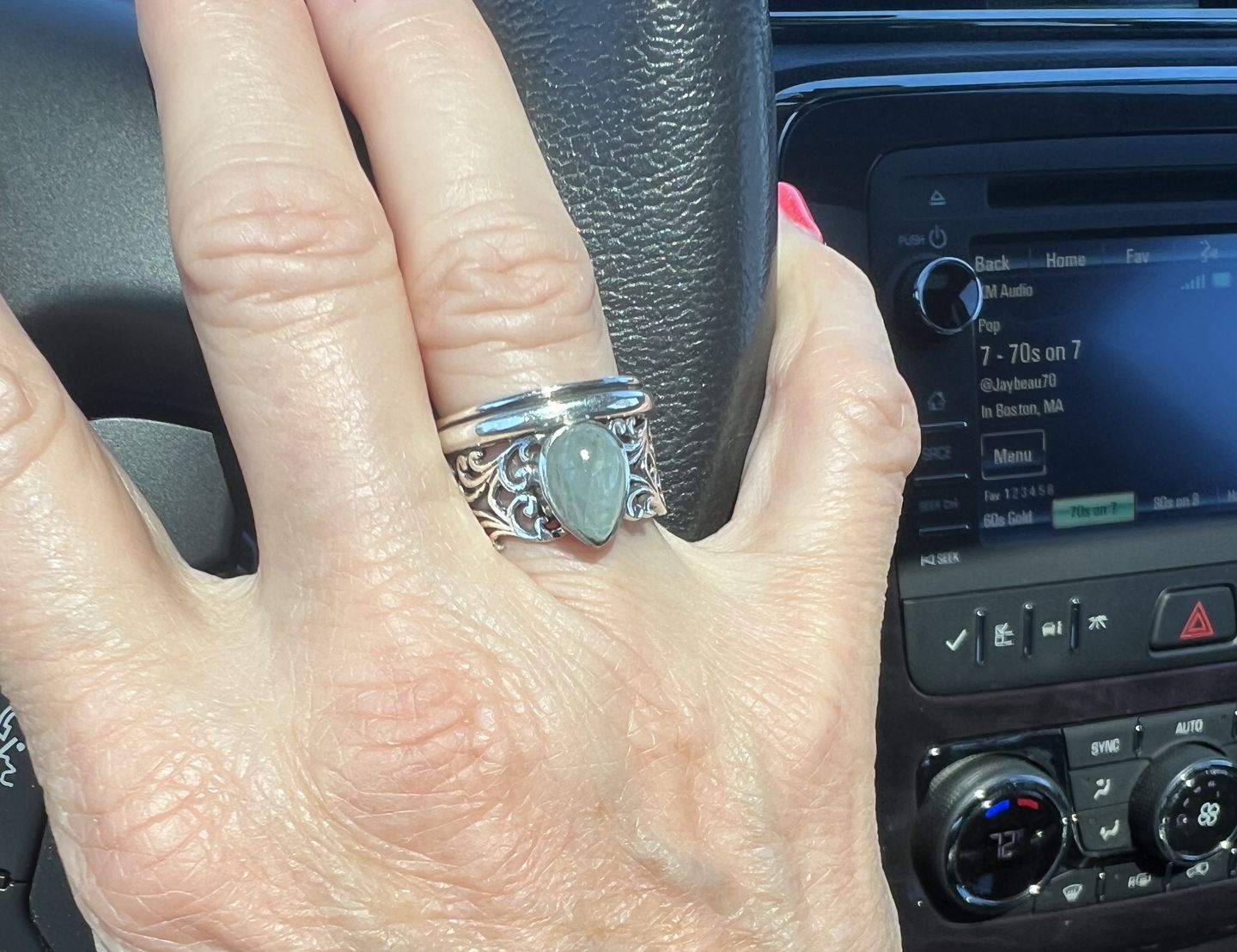 Customer photo review of Teardrop Aquamarine Fidget Ring Sterling Silver
