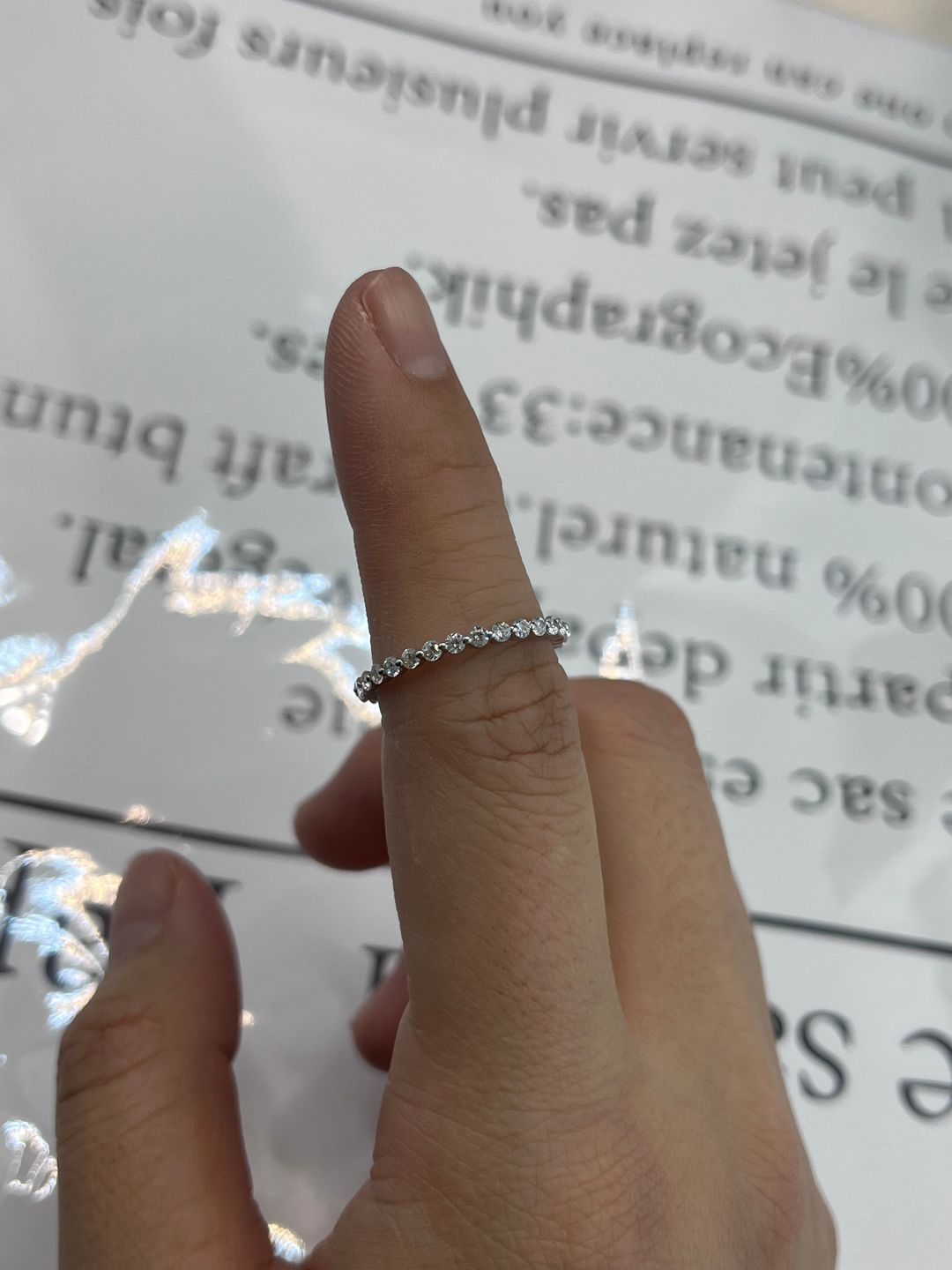 Customer photo review of Louily Classic Round Cut Full Eternity Wedding Band In Sterling Silver