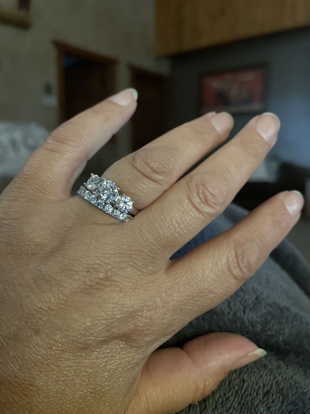 Customer photo review of Classic Three Stone Round Cut Moissanite Sterling Silver Wedding Ring
