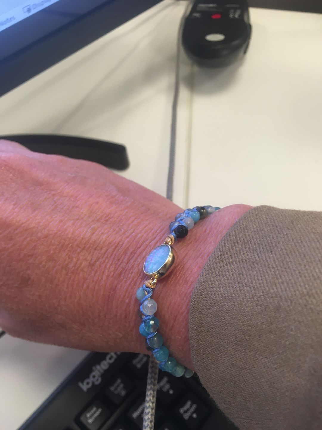 Customer photo review of Aqua Pura Opal Protection Bracelet